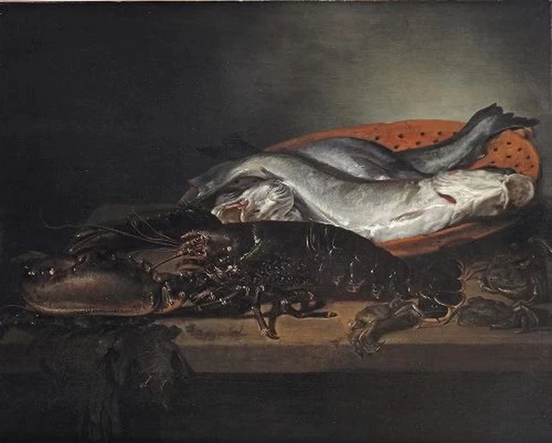 Un'aragosta, un pesce e un granchio su un tavolo